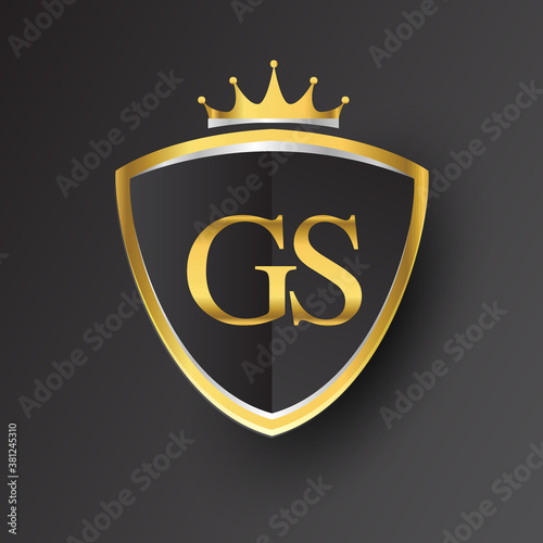 Initial logo letter GS with shield and crown Icon golden color isolated on black background, logotype design for company identity.