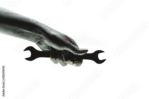 Hand tools serviсe icon isolated white background. Adjustable wrench. Creative mechanic concept. Car repair creative design. Repair house, technical equipment. Gray hand holds equipment for wheels