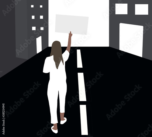 Black woman holding signs, banner and placards on a protest demonstration or picket.People against violence,pollution, discrimination, human rights violation walking on street.Black Lives Matter.