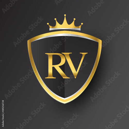 Initial logo letter RV with shield and crown Icon golden color isolated on black background, logotype design for company identity.