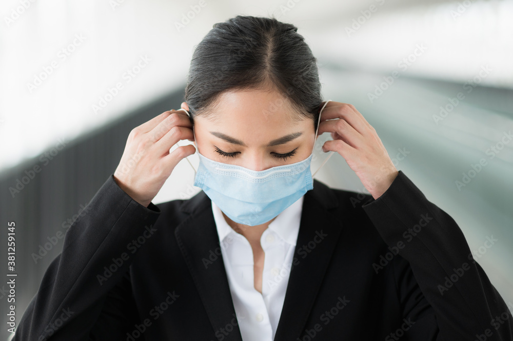 Business woman wearing protection mask. Beautiful female protective virus and pollution with face mask. Business woman wearing protection mask. Beautiful female protective virus and pollution with face mask.
