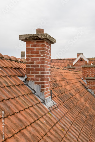 stone chimney on a roof