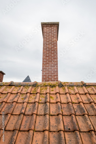 stone chimney on a roof