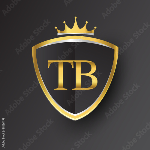 Initial logo letter TB with shield and crown Icon golden color isolated on black background, logotype design for company identity.