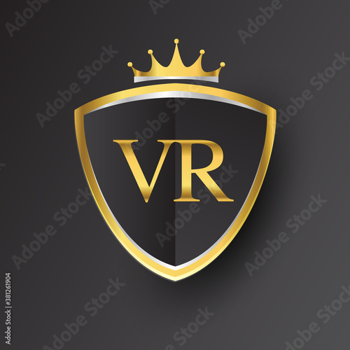 Initial logo letter VR with shield and crown Icon golden color isolated on black background, logotype design for company identity.
