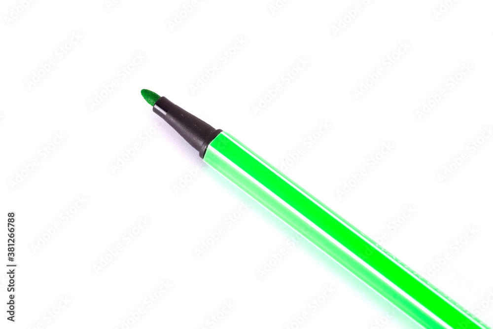 A green signature pen on white background