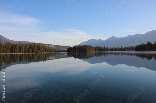 Fototapeta Naklejka Na Ścianę i Meble -  Reflections - Lake Beauvert, Jasper National Park, Alberta, Canada.