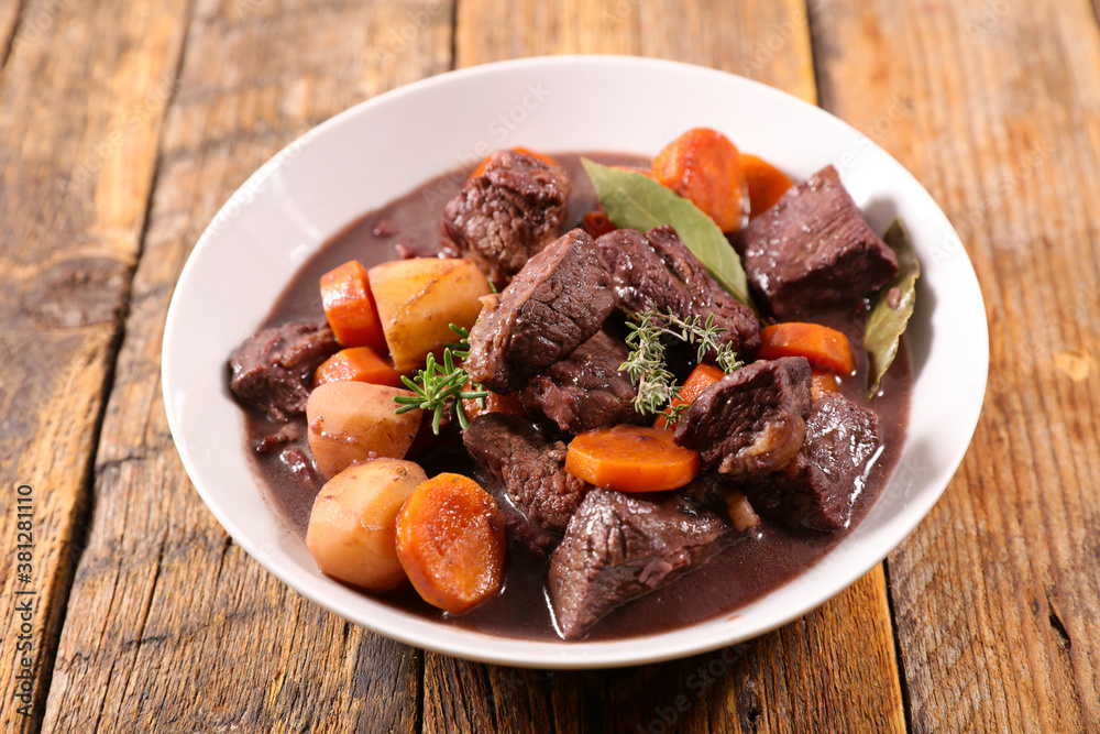 beef bourguignon- beef stew with carrot and wine beef bourguignon- beef stew with carrot and wine