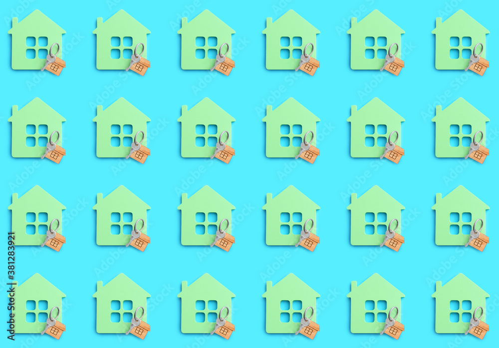 Many figures of house and keys on color background