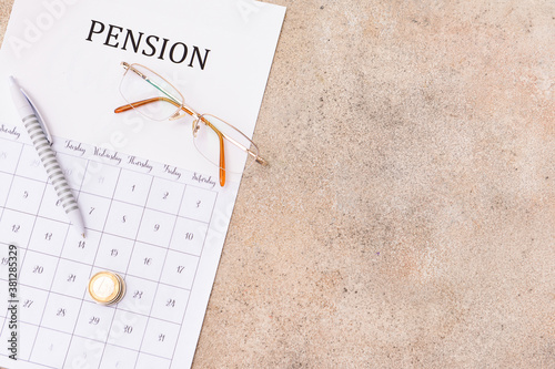 Calendar with coins, eyegla...