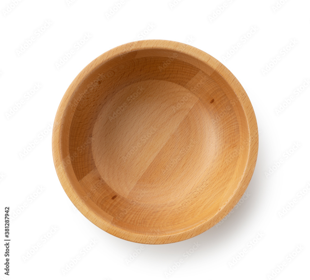 A wooden bowl on a white background A wooden bowl on a white background