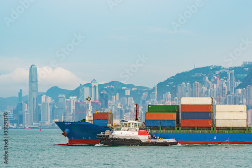 Photography Cargo ship in Victoria Harbor of Hong Kong city