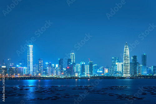 Skyline of Shenzhen city  China at night. Viewed from Hong Kong border