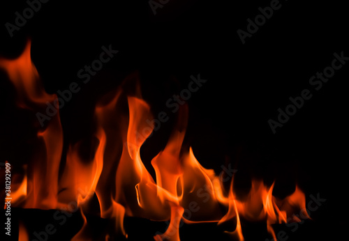 Red blaze Fire flame on a black background © OLAYOLA
