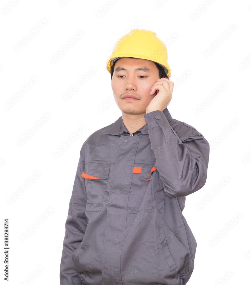 Migrant worker wearing yellow helmet is calling Migrant worker wearing yellow helmet is calling