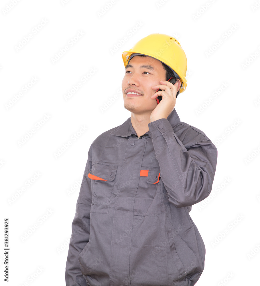 Migrant worker wearing yellow helmet is calling Migrant worker wearing yellow helmet is calling