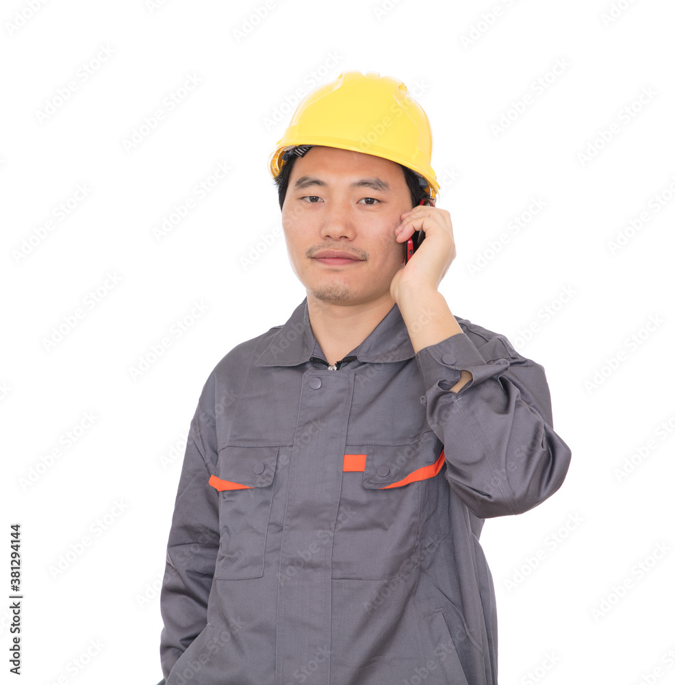 Migrant worker wearing yellow helmet is calling Migrant worker wearing yellow helmet is calling