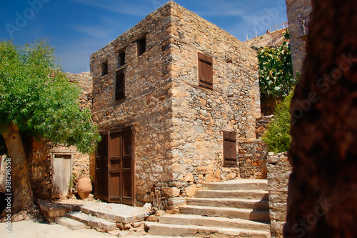 Obraz na płótnie Spinalonga, Greece - August 20, 2020 - An old house on the historic fortress island of Spinalonga w salonie