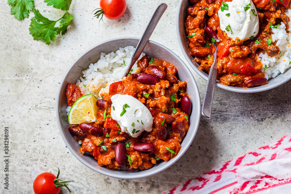 Ταπετσαρία Chili con carne with rice in gray bowl, top view