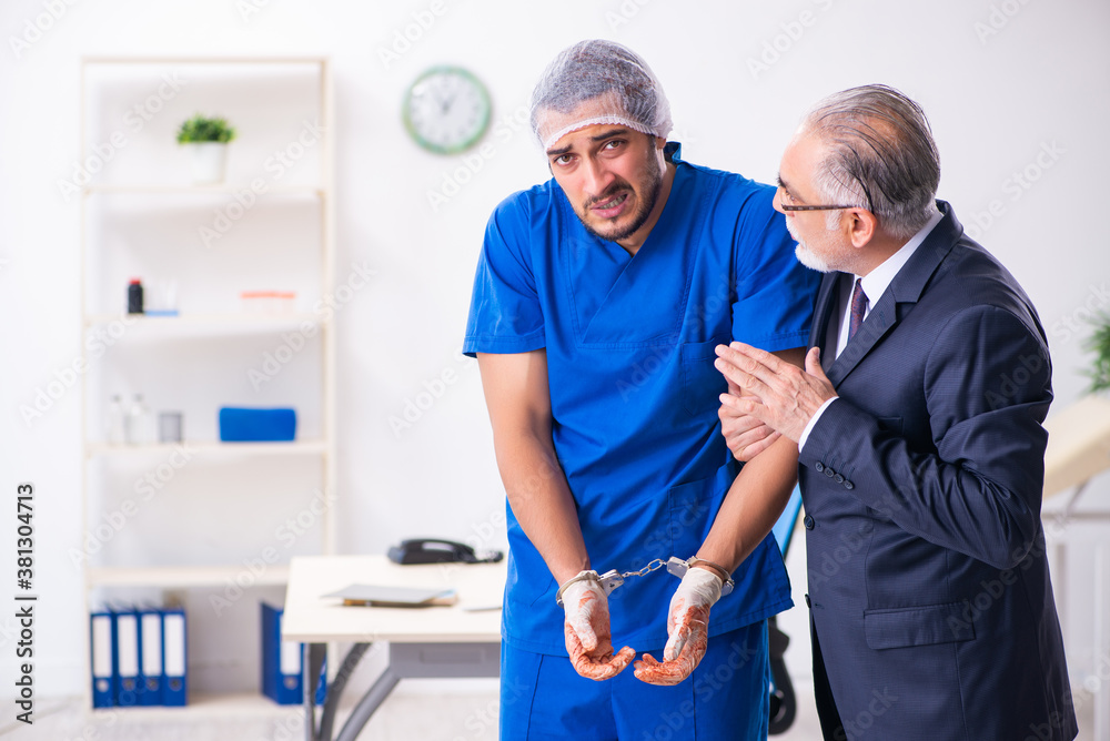 Fototapeta premium Male doctor in courthouse meeting with advocate