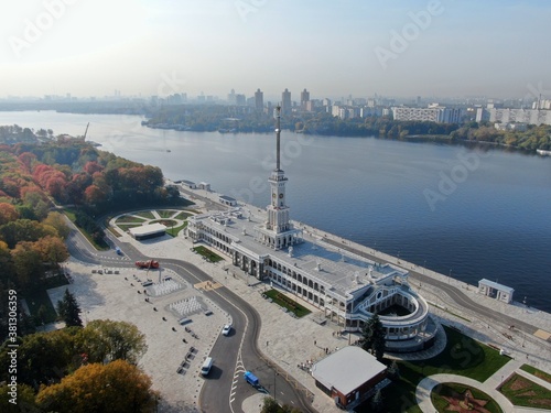 Aerial view flight over the passenger terminal in port. The new building of the Northern River Station in Moscow from a height on a clear day in autumn