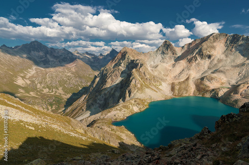 Day landscape mountain lake high in the mountains against the background of the Caucasian highlands in the North Caucasus