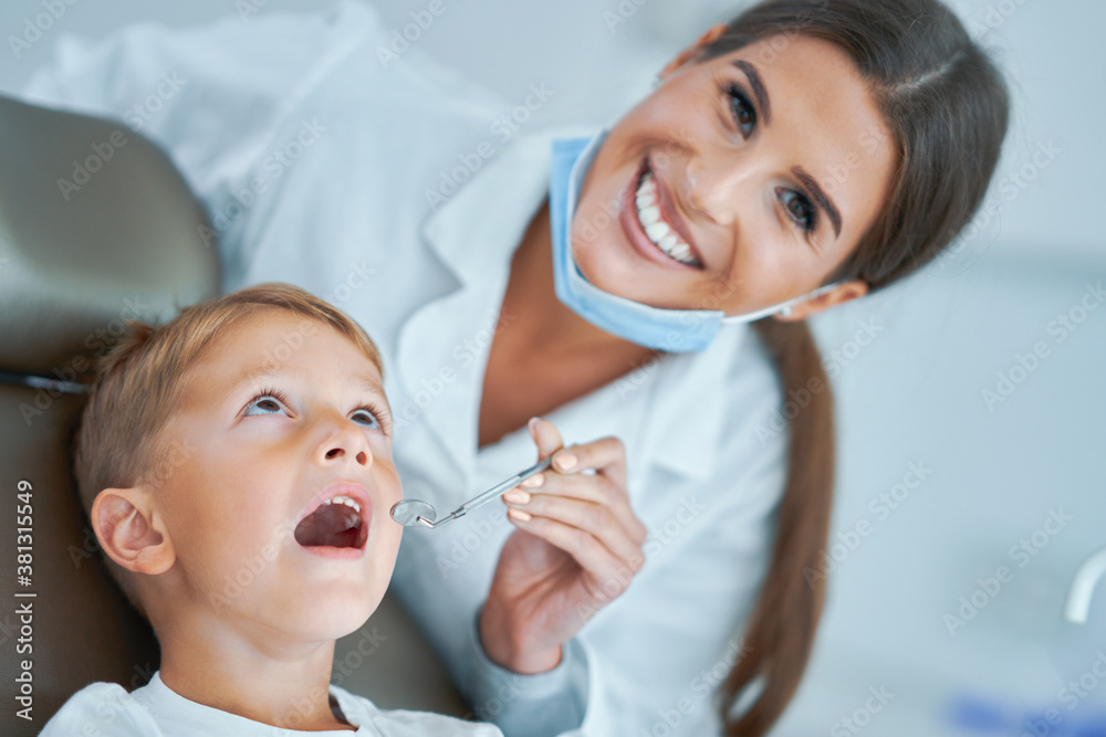 Little boy and female dentist in the dentists office Little boy and female dentist in the dentists office
