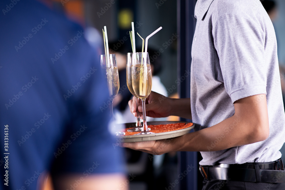 waiter serving drink