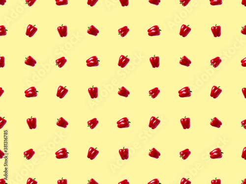 sweet bell pepper pattern. vegetables on a pastel yellow background.