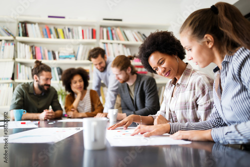 Businesspeople discussing together in conference room during meeting at office