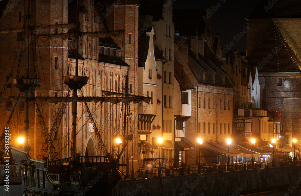 Night view of the river Motlawa waterfront in medieval Old Town of Gdansk, Poland.