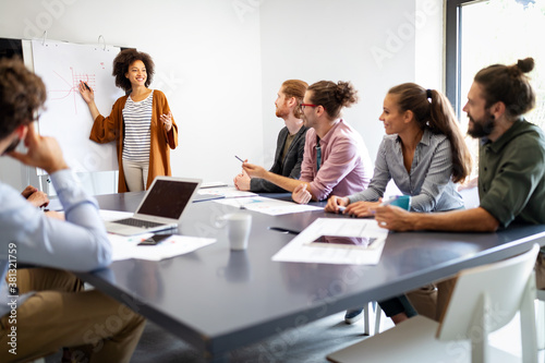 Businesspeople discussing together in conference room during meeting at office