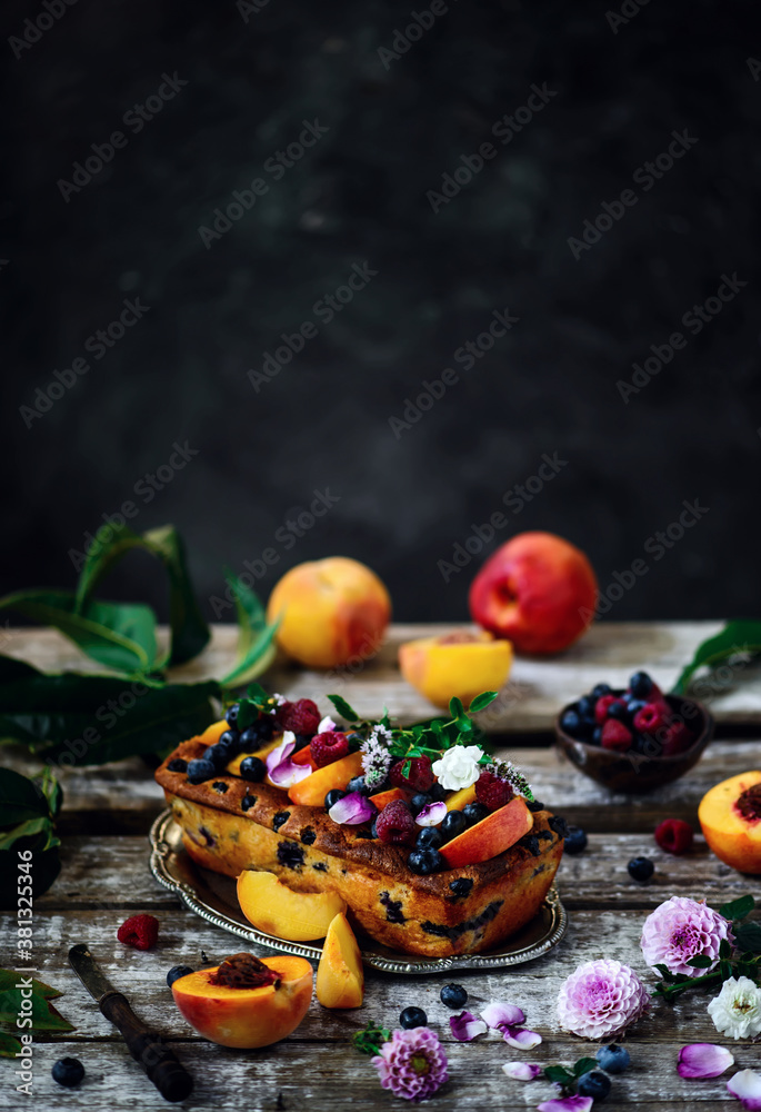 Peach and blueberry cake.. rustic photo