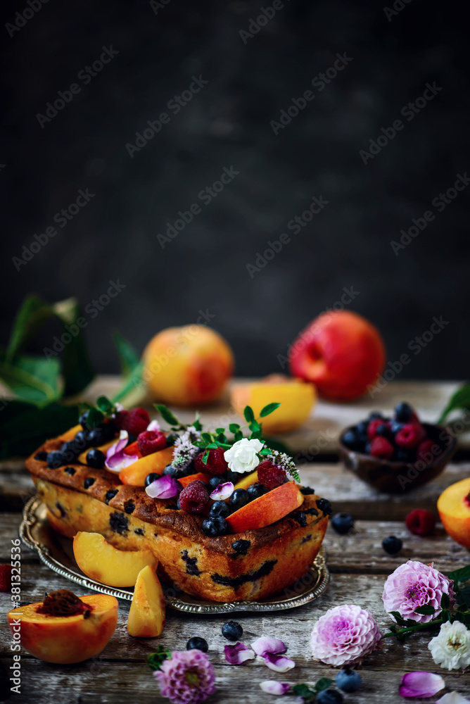 Peach and blueberry cake.. rustic photo