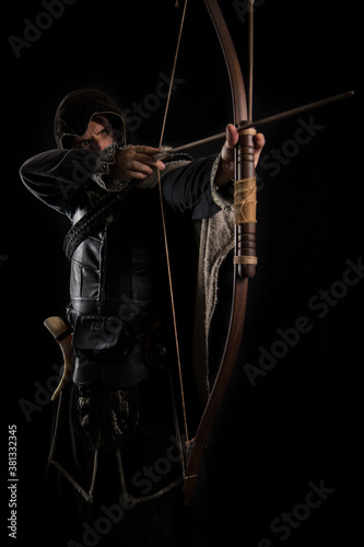 Medieval archer with a shooting bow.