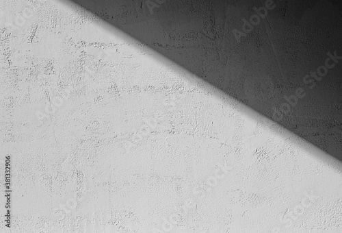 Shadows on the gray concrete wall from the sun. Shadow background.