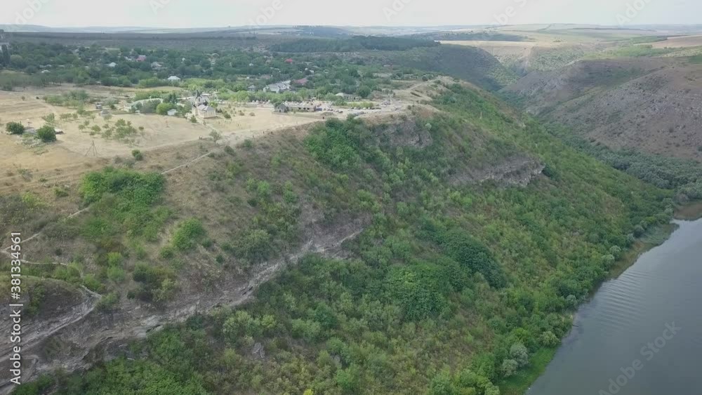 Drone flight over a mountain gorge. Tsypovo Rock Monastery, Moldova. High quality 4k footage Drone flight over a mountain gorge. Tsypovo Rock Monastery, Moldova. High quality 4k footage