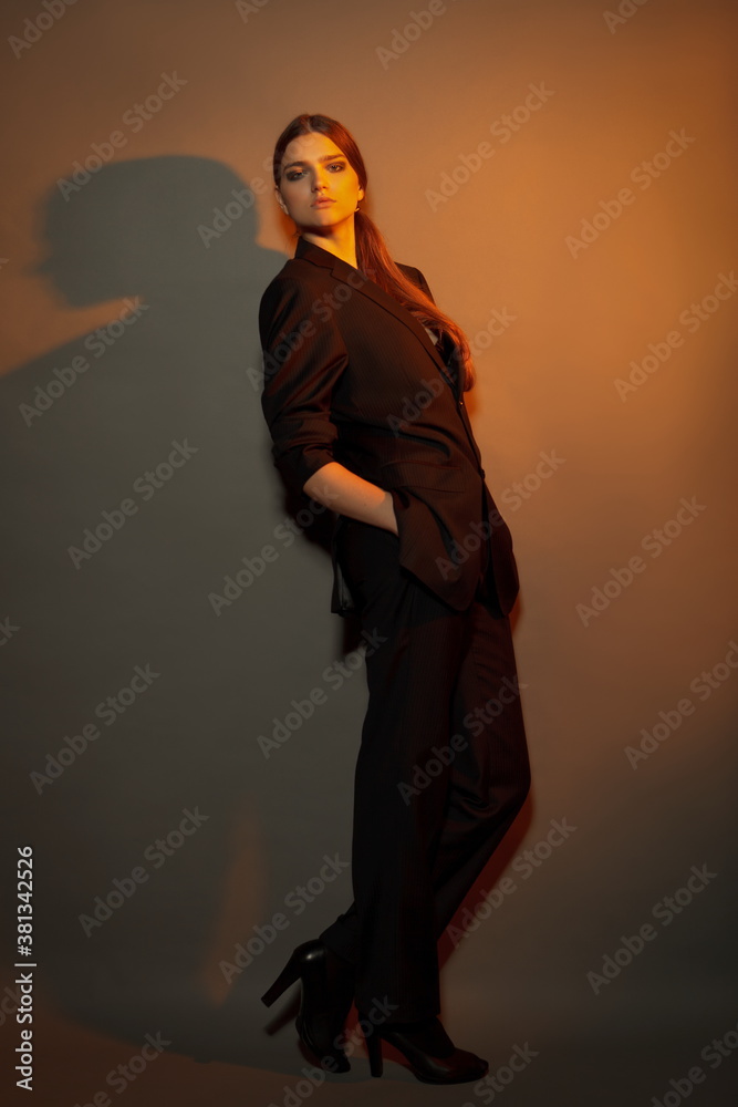 Full-length portrait of businesswoman isolated on background