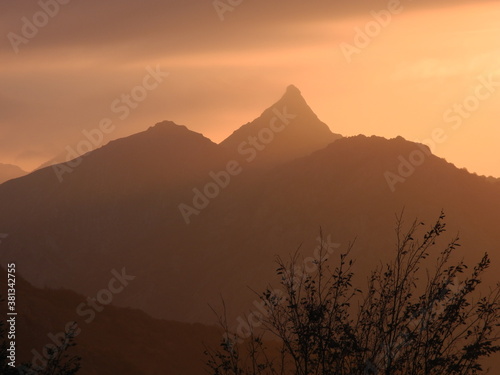 Silhouette of the mountains in the early morning in beige tones