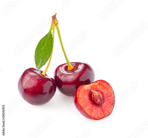 Isolated cherries. Three juicy cherry fruits isolated on white background