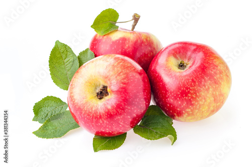 Ripe red apples with leaf on white background isolate