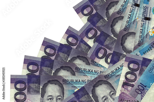 100 Philippine piso bills lies in different order isolated on white. Local banking or money making concept photo