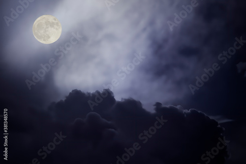 Overcast full moon night