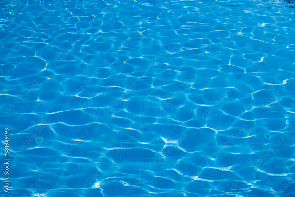 surface of blue swimming pool,background of water in swimming pool.