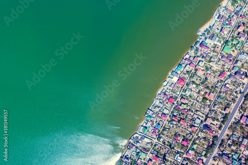 Seascape. Village on the seashore. Top view of the sea and shore