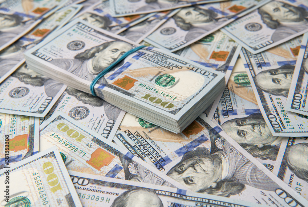 Stack of one hundred dollar bills close-up. Stack of one hundred dollar bills close-up.