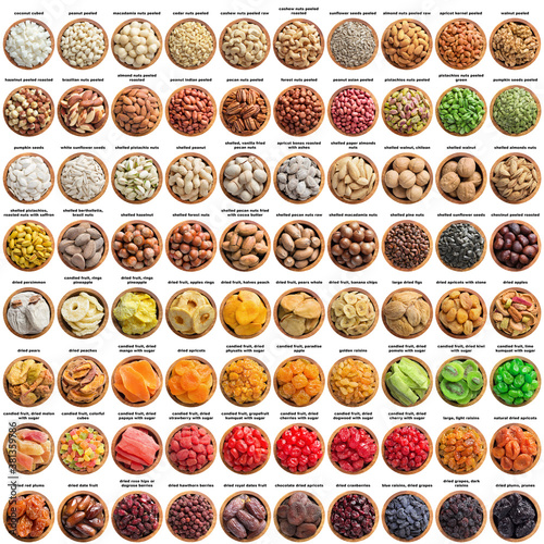 Fototapeta Naklejka Na Ścianę i Meble -  large set nuts seeds, candied and dried fruits isolated on white background. organic food in wooden plate, top view.