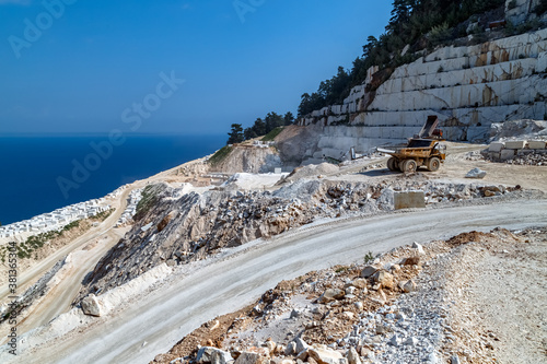 Greece, Thasos island. Steep road to the marble beach, marble extraction works on the way. Travel Europe, holidays in Greece on the islands. photo