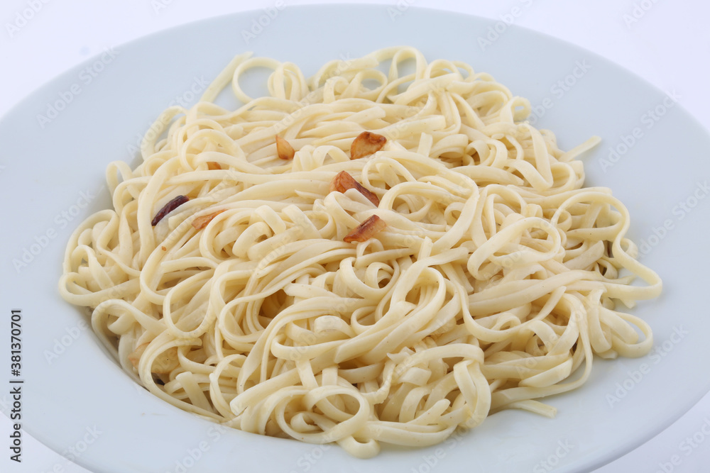 italian spaguetti pasta cooked with garlic and oil italian spaguetti pasta cooked with garlic and oil