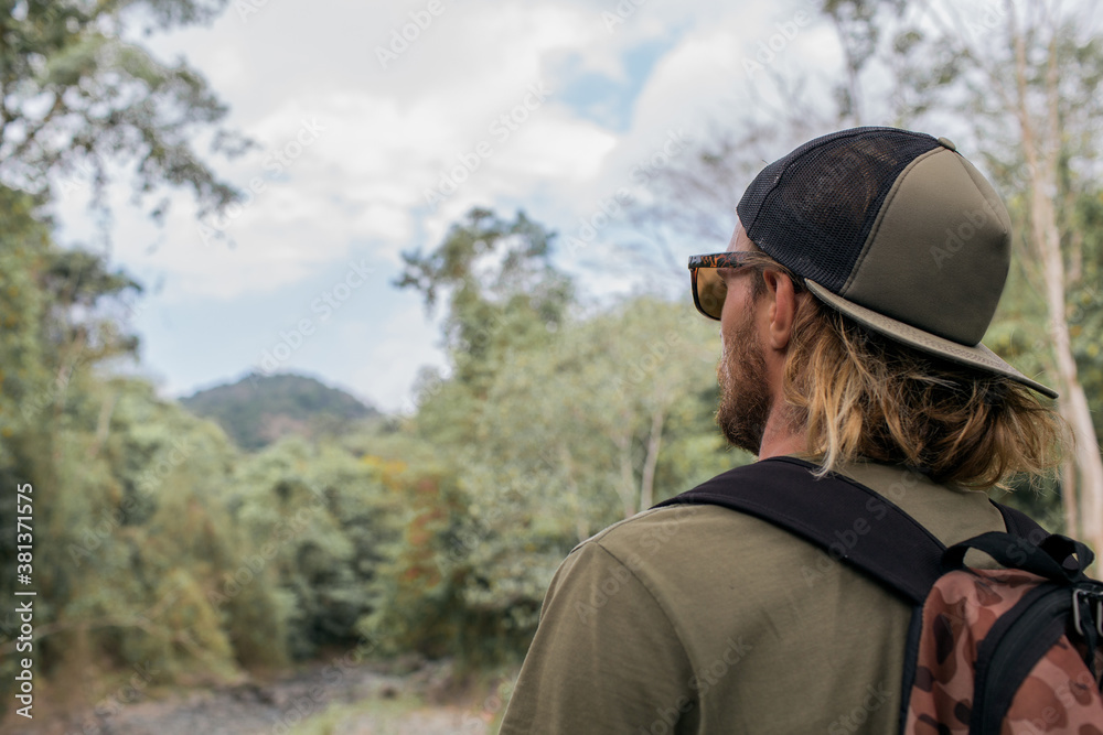 tourist walks through the woods tourist walks through the woods